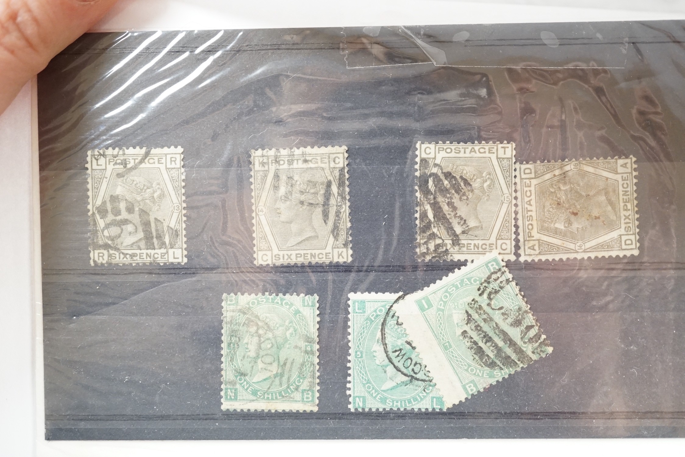 Great Britain Queen Victoria stamps with 1840 1d black (x2 cut into),1841 2d blue pair on cover,1877 £1 telegraph used, 1870 1/2d used and mint, 1882. 2 shilling, 6d, mint
